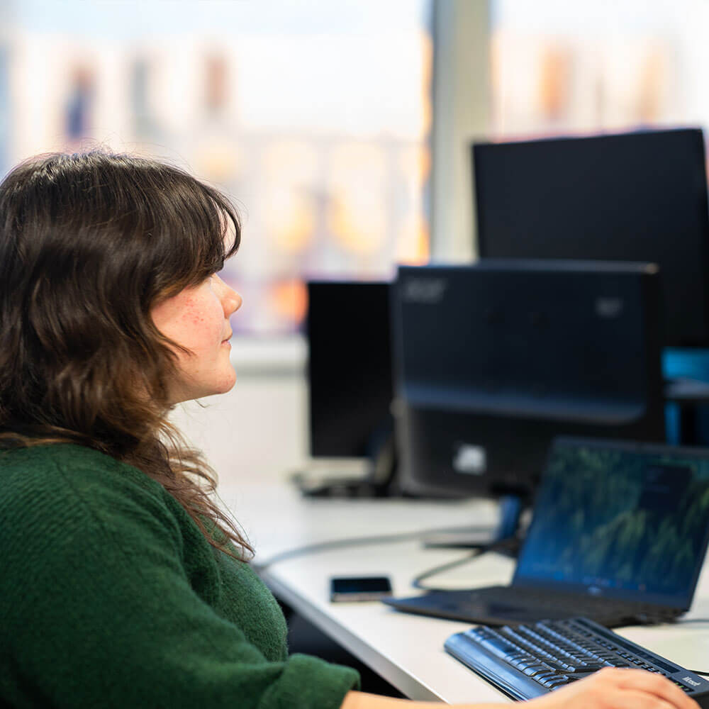 Implementation - Emily working in Tech Implementation - Emily working in Tech