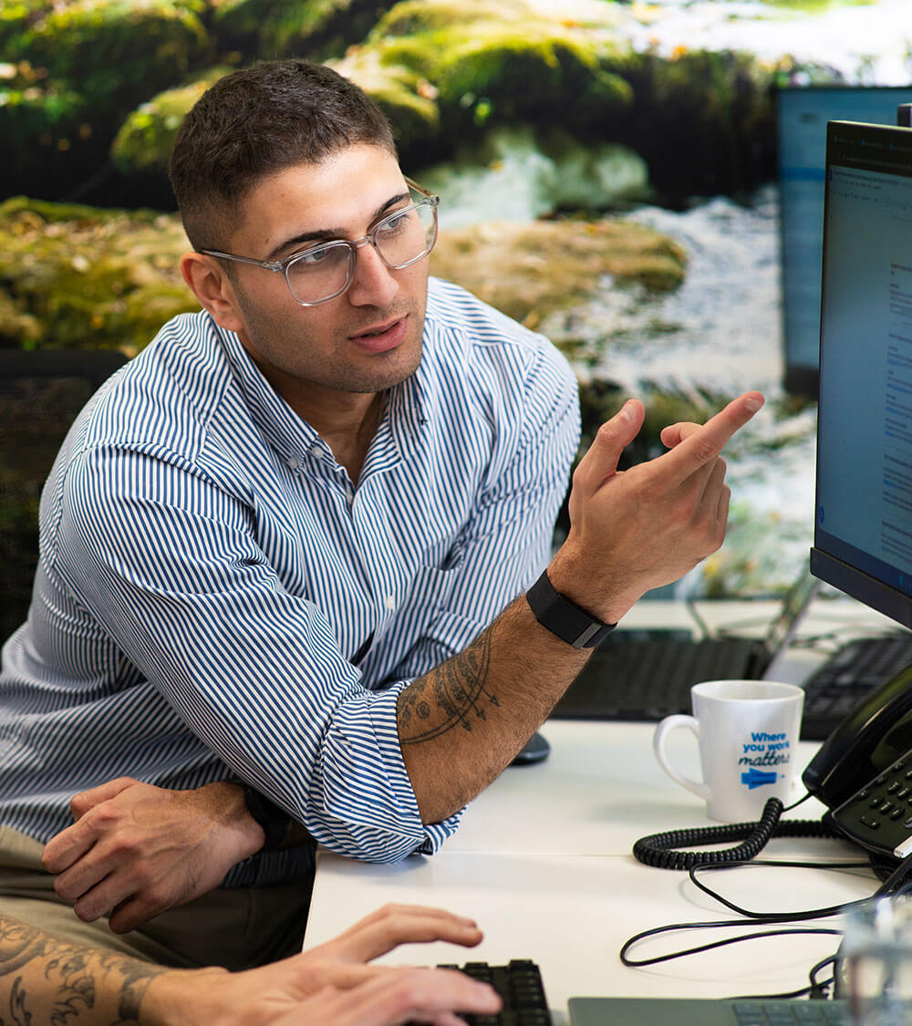 Birju working in Bristol office